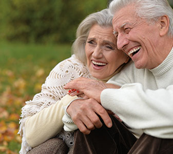 Laughing couple. Links to What to Give
